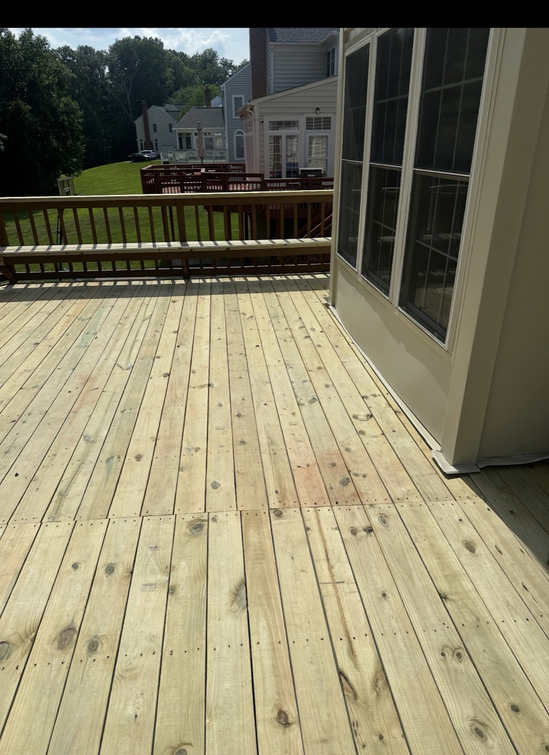 Large custom wood deck built by PPMI