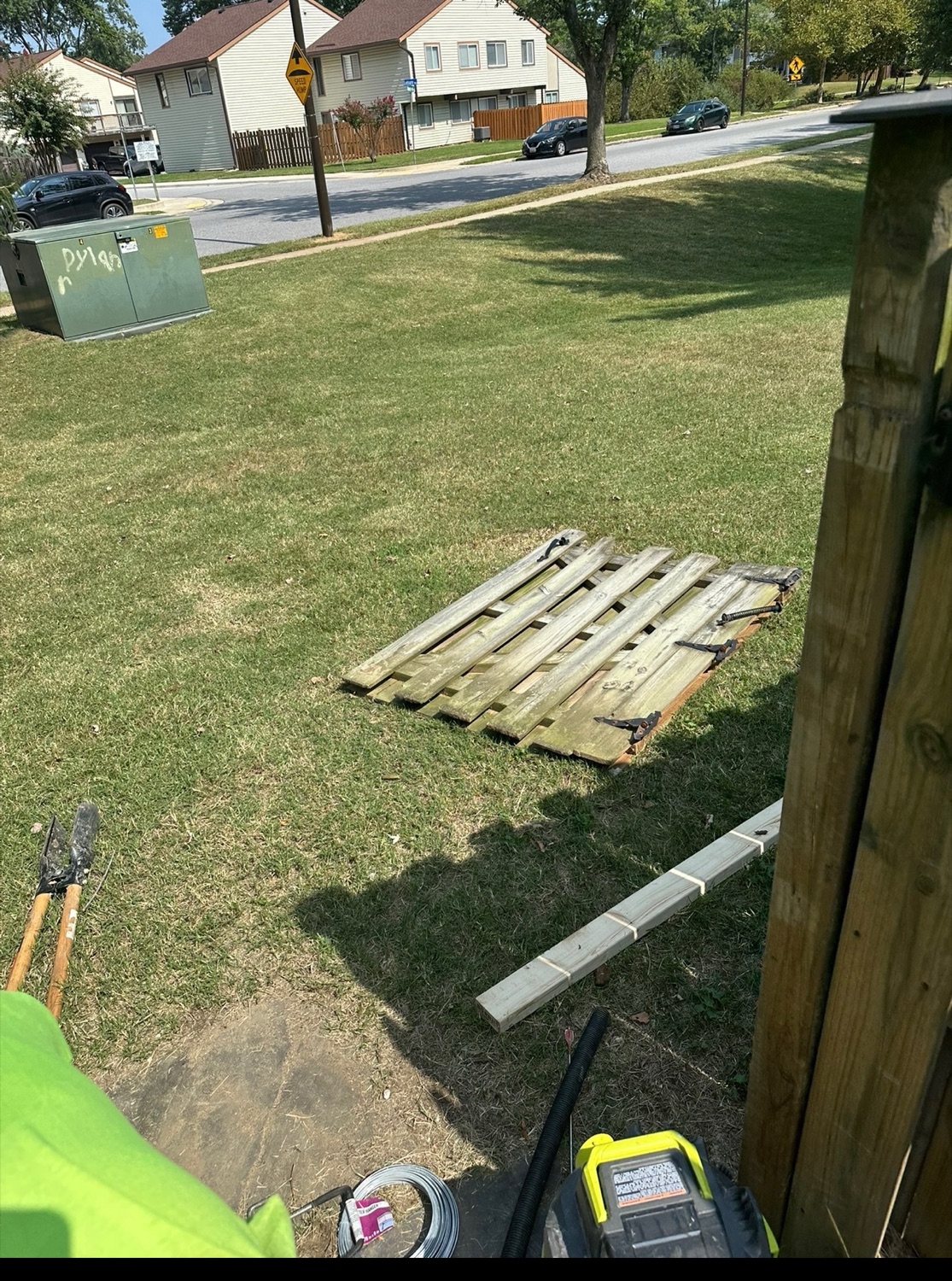 Grounds cleanup and debris removal in progress